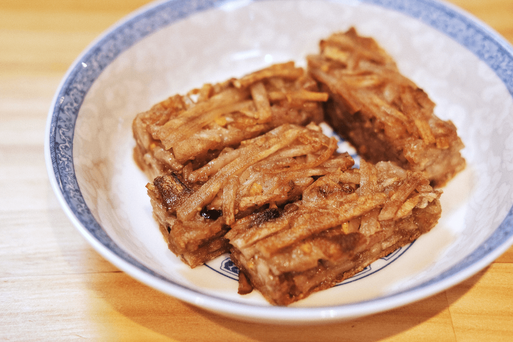 巷口神級油飯、童年鹹冰棒、香酥蔥肉燒餅:高雄「建興路」一日市場美食5選 - 第8張圖